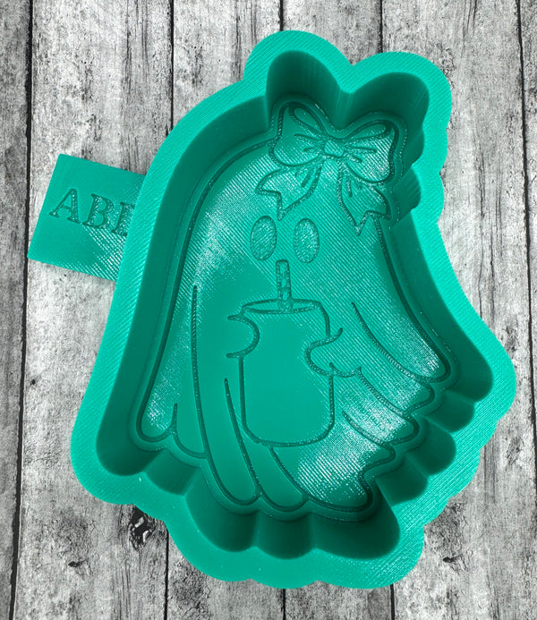 Ghost mold with soda can and bow